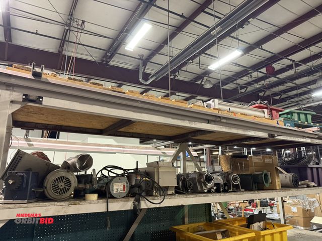 Lot 1-15630 - Entire content of shelf shown in photo, includes assorted used motors, gear reducers, and miscellane...