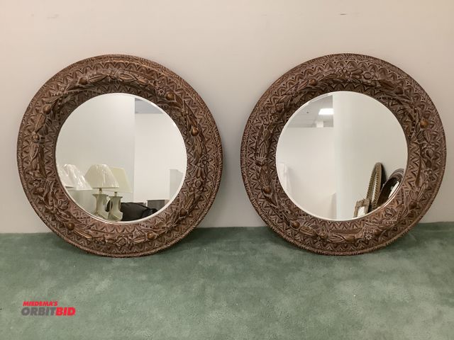 Lot 1-17228 - (2) round decorative mirrors measuring 45” in diameter.