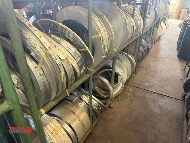 Lot 1-18755 - (1) 96" length x 64" height x 16" depth 3-tier tube steel rack with assorted anodized aluminum rolls...