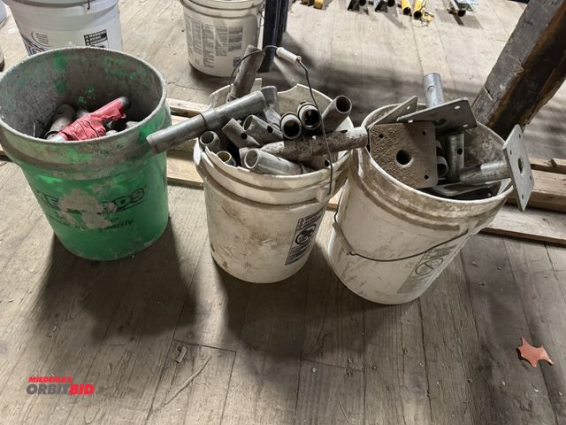 Lot 1-2618 - (1) bucket of scaffold platform feet, and (2) buckets of scaffolding pins.  (Greg)