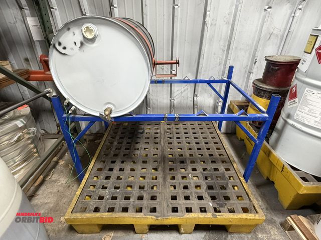 Lot 1-18786 - (1) 55 gallon drum stand with spill containment pad, stand is 57" wide x 33" deep, includes Eagle lo...