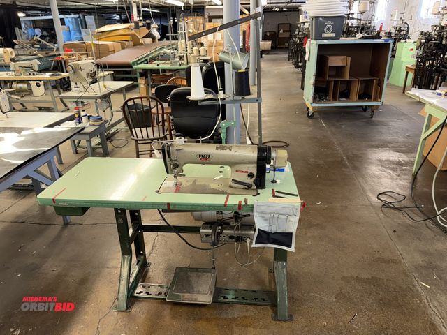 Lot 1-4738 - (1) PFAFF single needle sewing machine with power table, 48" wide x 20" deep x 30" tall and spool st...