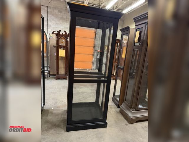 Lot 1-9253 - (1) Howard Miller illuminated curio/display cabinet, 28.5" wide x 12.5" deep x 78.5" tall, model 680...