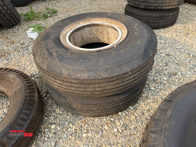 Lot 1-18254 - Lot of (2) new Sumitomo ST727 8.25R15TR tires with rims.