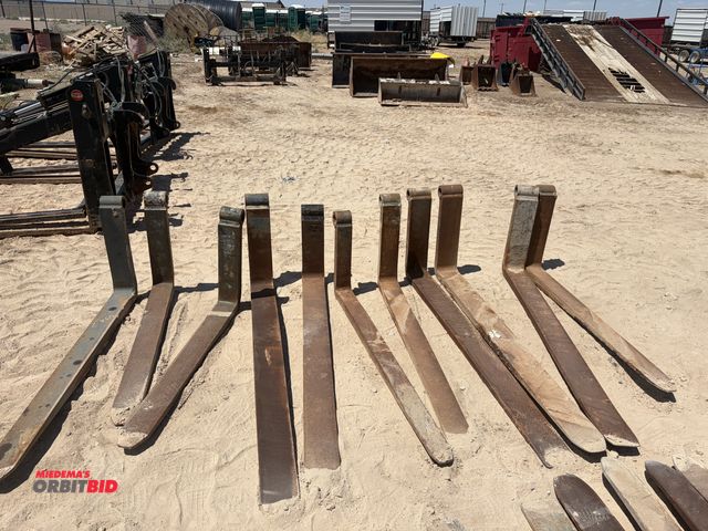 Lot 1-18301 - (11) Assorted forklift forks, forks are used, various lengths and widths, one has several bend