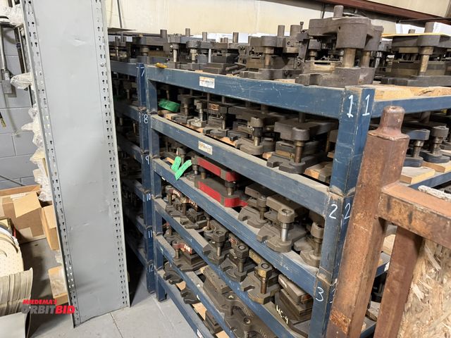 Lot 1-18959 - Lot of (12) steel racks, 36" x 48" x 9" tall, filled with assorted hour and minute hand dies, in usa...