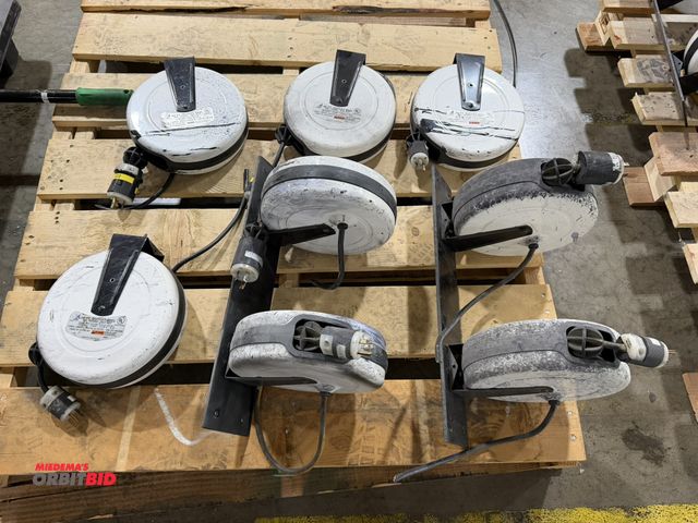 Lot 1-5339 - Lot of (2) custom made steel, 20" long retractable cord reel mounts with (4) various 30' retractable...
