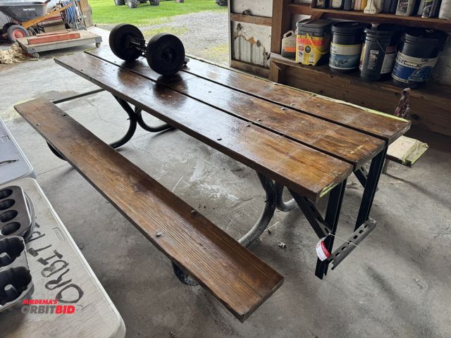 Lot 1-12300 - (1) 96" wood picnic table, includes wheel dolly for moving the table.
