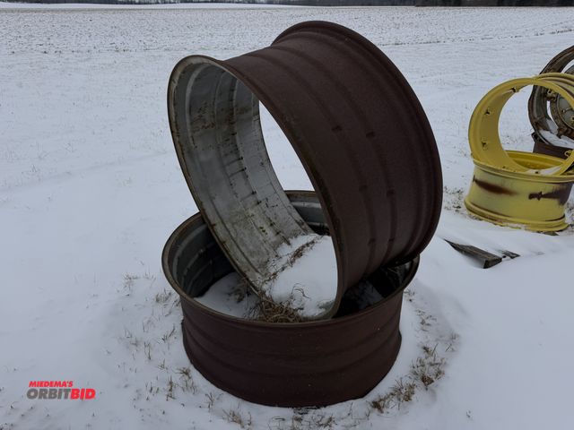 Lot 1-11656 - Lot of (2) tractor tire rims, approx. 42" diameter, 18" from inside of bead to inside of bead.