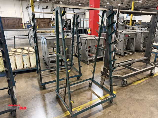 Lot 1-5144 - Set of (2) matching 35" width x 66" height x 30" depth rolling, steel framed cantilever racks, with ...