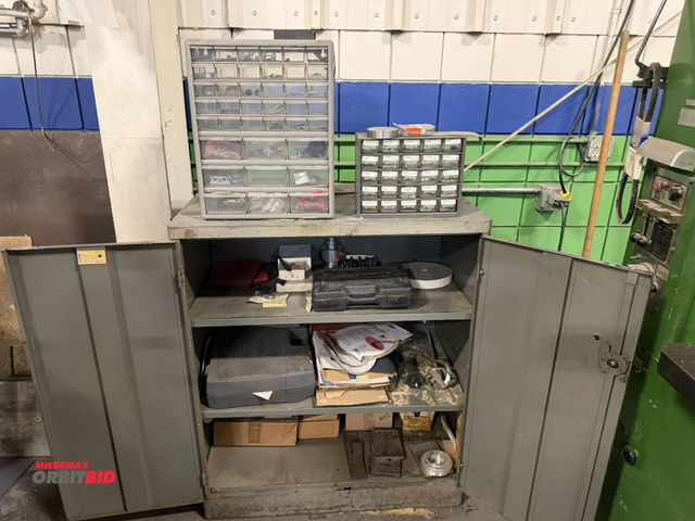 Lot 1-18576 - (1) 2-door storage cabinet, 36" wide x 21" deep x 42" tall with contents, includes 2 plastic parts b...