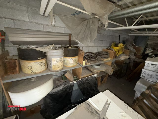 Lot 1-17073 - (3) sections of metal shelving with contents, includes assorted machine parts, pulleys, sprockets, r...