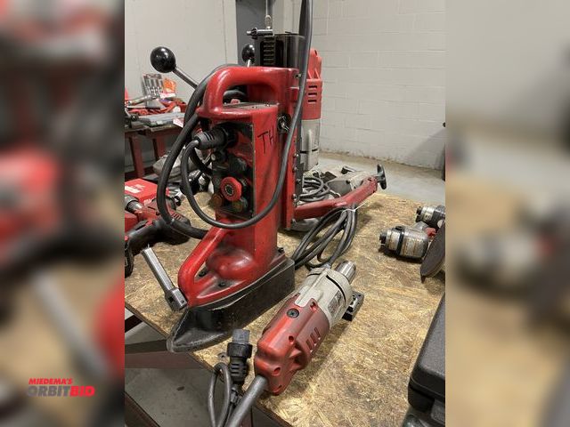 Lot 1-19354 - (1) Milwaukee electromagnetic drill press, Cat 4263, S/N B38A19838472, and Milwaukee 1/2" drill moto...