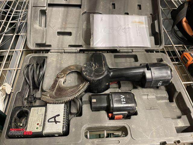 Lot 1-6277 - (1) KuDos cable cutter, model REC50, includes (2) batteries, charger, and case.