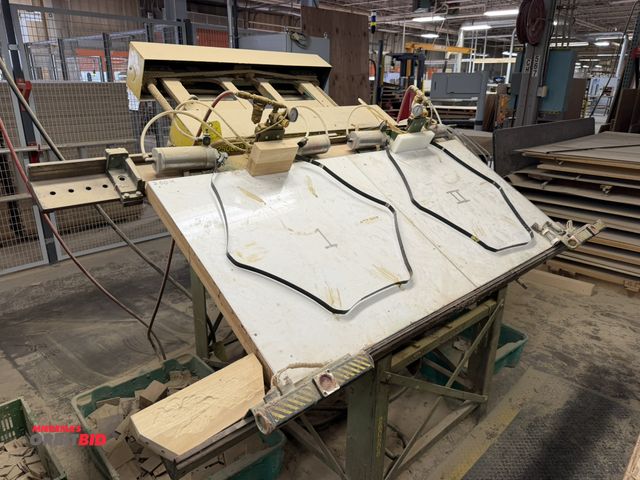 Lot 1-16547 - (1) dual station pneumatic clamping table, 60" x 32" with metal straps, push button operation, winni...