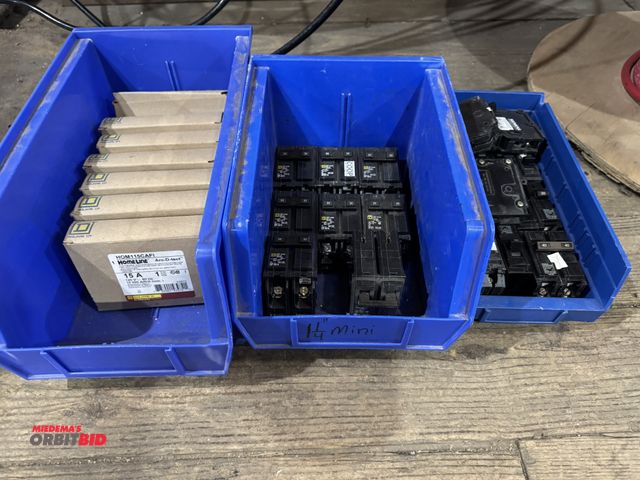 Lot 1-4419 - Large lot of Square-D Homeline breakers, includes (7) new in box Homeline Arc-D-Tect 15 amp breakers...