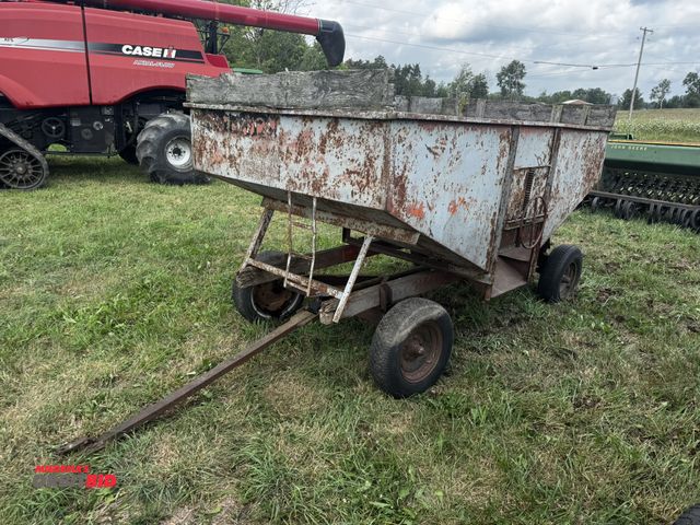 Lot 1-19714 - (1) gravity box 10' long x 6' wide with running gear, pin style hitch, 1 tire will need to be replac...