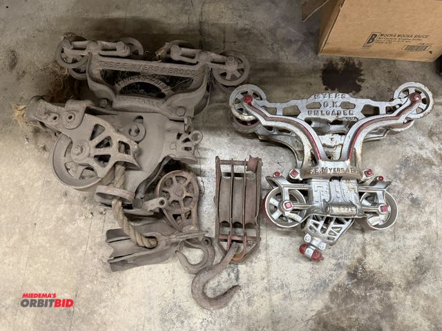 Lot 1-1456 - Lot of assorted vintage trolleys, and (1) 3-pulley block with hook.