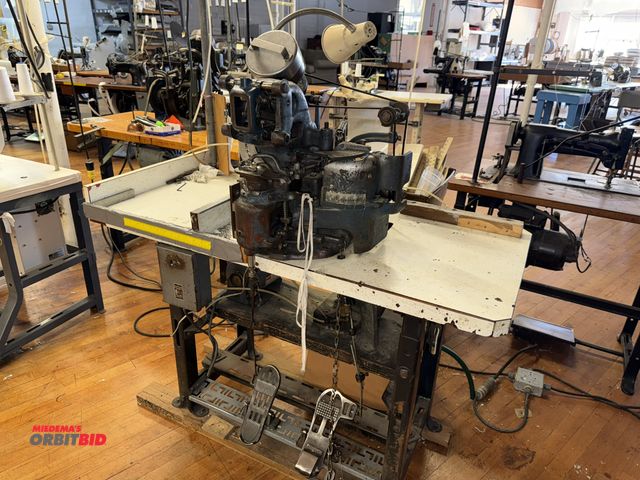 Lot 1-4668 - (1) United Shoe Machinery Corporation, model C, eyeleting machine, S/N 3396, mounted on a power tabl...