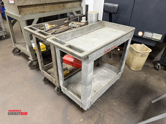 Lot 1-12436 - Lot of (2) Rubbermaid 34" length x 33" height x 17" depth, 2-tier resin style shop carts, 1 includes...