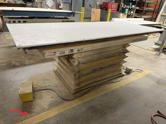 Lot 1-16669 - (1) Southworth pneumatic lift table, foot pedal control, 200 lb. capacity, 72" x 30" wide, custom bu...
