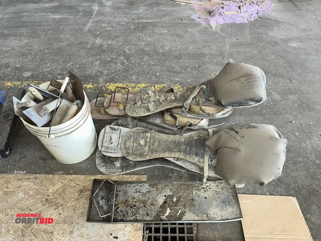 Lot 1-14165 - Large lot of assorted concrete worker knee boards and hand trowels.