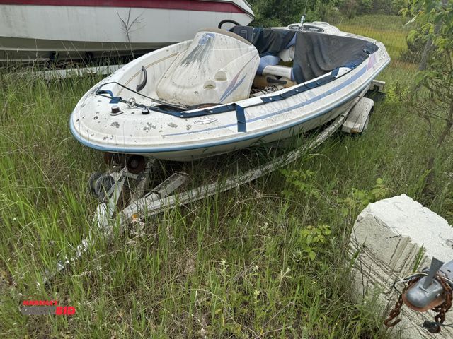 Lot 1-6573 - (1) Sea Rayder Z-14' boat with trailer, for parts or repair, severe weather damage, Hull ID# SPFW4-1...