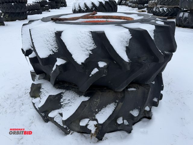 Lot 1-11634 - (1) set of used Goodyear 23.1-34 tires on 10-bolt rims, tires are cracked and weather checked.