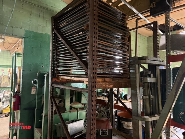 Lot 1-18663 - Set of Teardrop style pallet racking, includes (2) 48" depth x 113" height uprights, and (4) 58" bea...