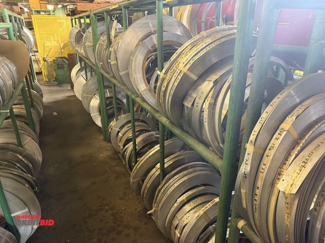 Lot 1-18756 - (1) 96" length x 64" height x 16" depth 3-tier tube steel rack with assorted aluminum rolls, most ro...