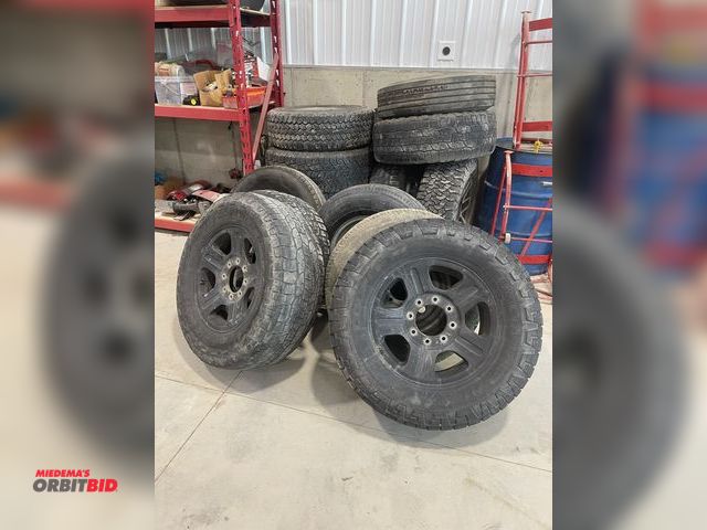 Lot 1-18760 - Lot of (15) assorted truck and trailer tires and rims, various sizes and conditions.