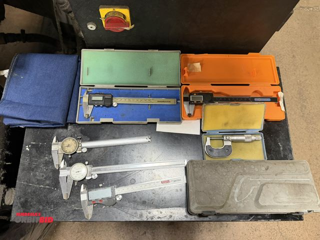 Lot 1-12504 - Lot including (4) 6" digital calipers (3 with cases, 1 without), (1) 0-1" micrometer with case, and ...