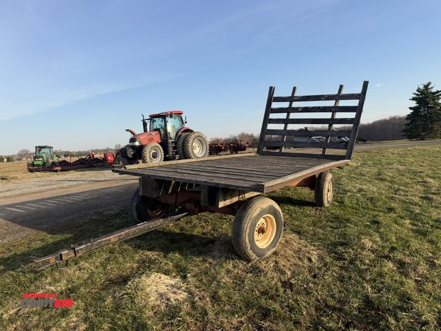 Lot 1-19120 - (1) Hay Wagon with rear rack, J &amp; M running gear, extendable tongue, 16' long x 8' wide.