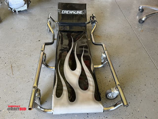 Lot 1-8233 - (1) Crew Line stainless steel framed creeper with plastic pad.