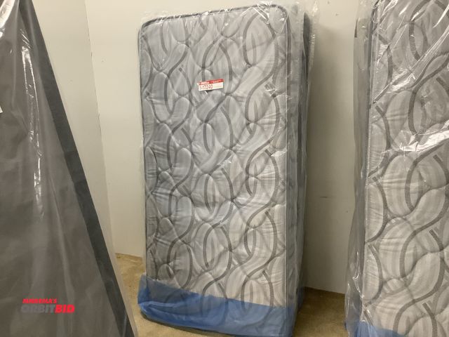 Lot 1-17240 - Twin size mattress and box spring set.