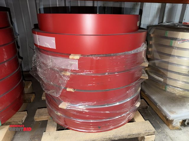 Lot 1-18772 - Lot of (6) full and (1) partial coil of 3" x .016" thickness aluminum, black and red, approx. 26" di...