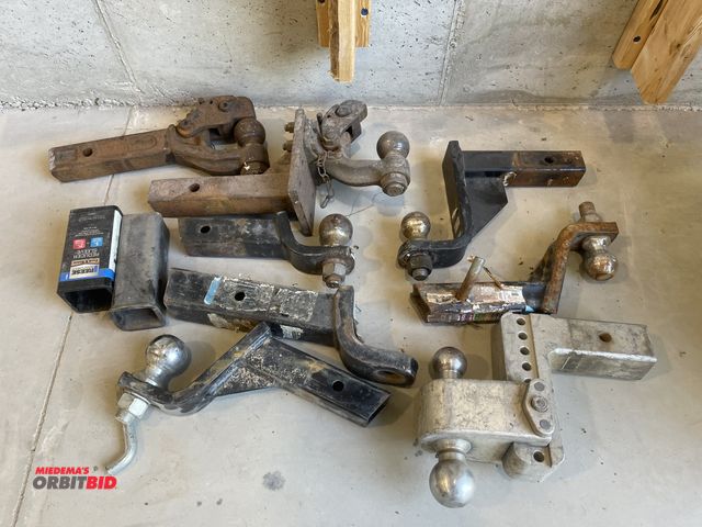 Lot 1-18751 - Large lot of assorted hitches, includes (2) pintle hitch, (1) adjustable aluminum hitch, 2 5/16" and...