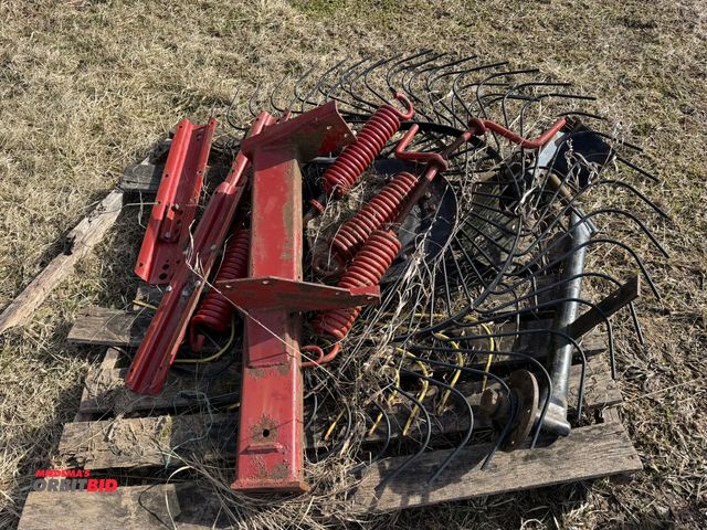 Lot 1-11806 - Lot of assorted hay rake parts.