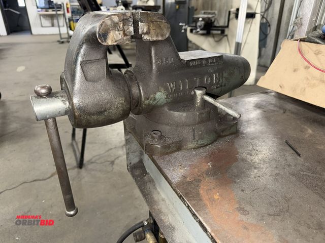 Lot 1-15342 - (1) Wilton 450 bullet style, 4.5" bench vise with 3" x 4" plate, winning bidder responsible for prop...