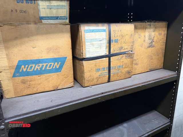 Lot 1-1833 - (3) boxes with approx. (8) new Norton 10" diameter x 1" thick grinding wheels with approx. 3" diamet...