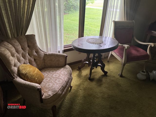 Lot 1-3112 - (1) Wooden table, (1) wooden end table, (2) chairs, couch, and (1) rocking chair