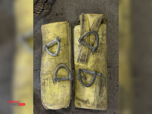 Lot 1-1281 - Set of (2) 12" wide, 20-ton roll over straps with shackles.