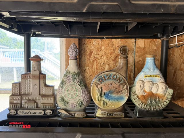 Lot 1-8325 - Lot of (4) collectible whiskey bottles.