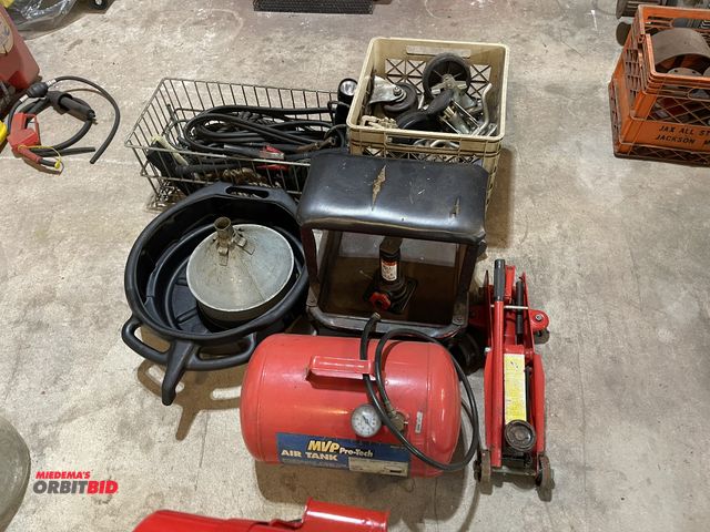Lot 1-11884 - Lot of assorted automotive items, includes MVP air tank, floor jack, oil drain pan, jumper cables, t...