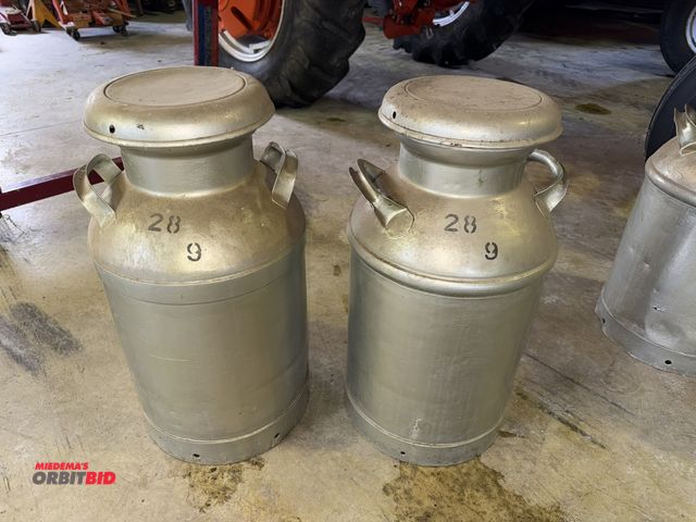 Lot 1-12149 - (2) milk jugs, approx. 25" tall.