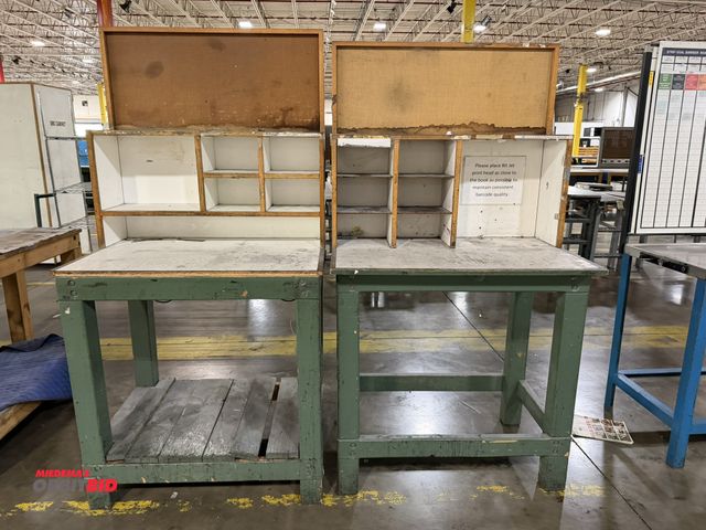 Lot 1-5283 - Lot of (2) 37" width x 38" height x 26" depth heavy duty wood framed work stations, both with 19" ta...