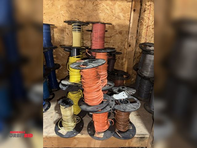 Lot 1-4519 - Lot of (24) partial spools of 10 gauge wire, yellow, orange and brown.
