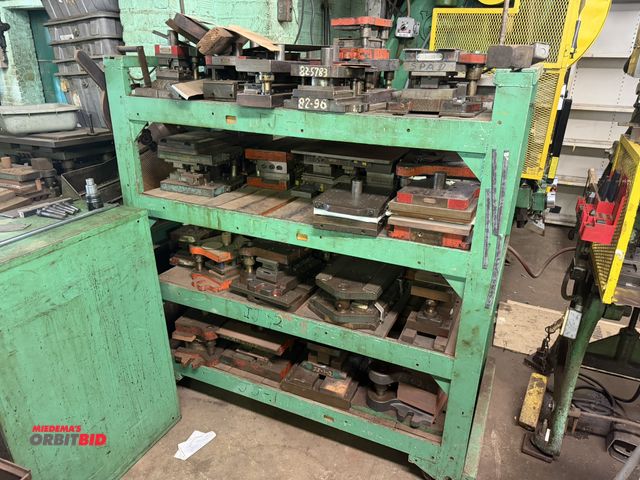 Lot 1-18651 - (1) 60" width x 62" height x 32" depth heavy duty shelving unit full of assorted press dies.