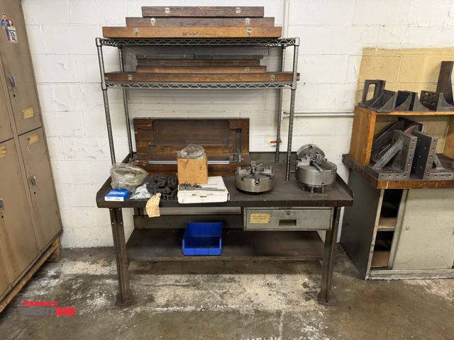 Lot 1-6320 - (1) steel frame/wood top shop table, 60" x 31" deep with a partial Metro style 2-shelf rack, does no...