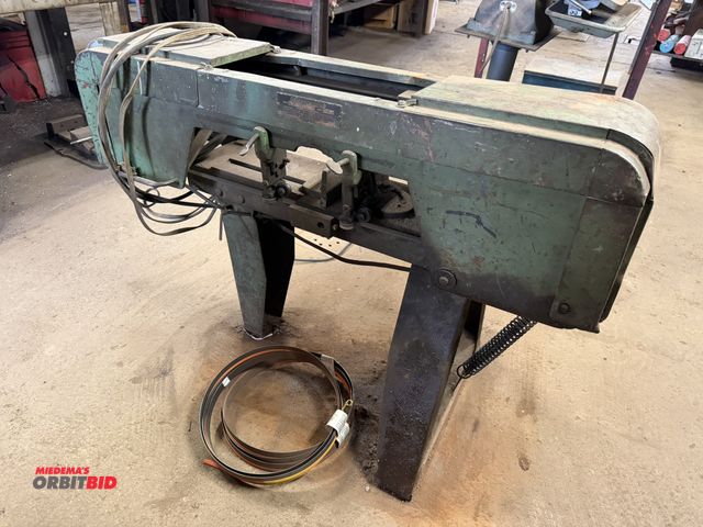 Lot 1-18570 - (1) Johnson horizontal band saw, approx. 9" throat, 120V, said to need adjustment, currently cuts cr...